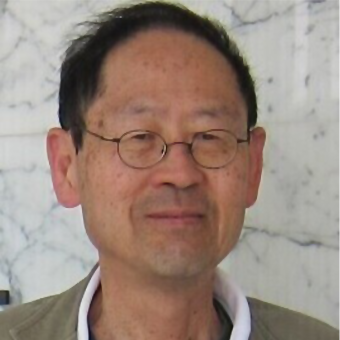 headshot of an asian man with short black hair and glasses